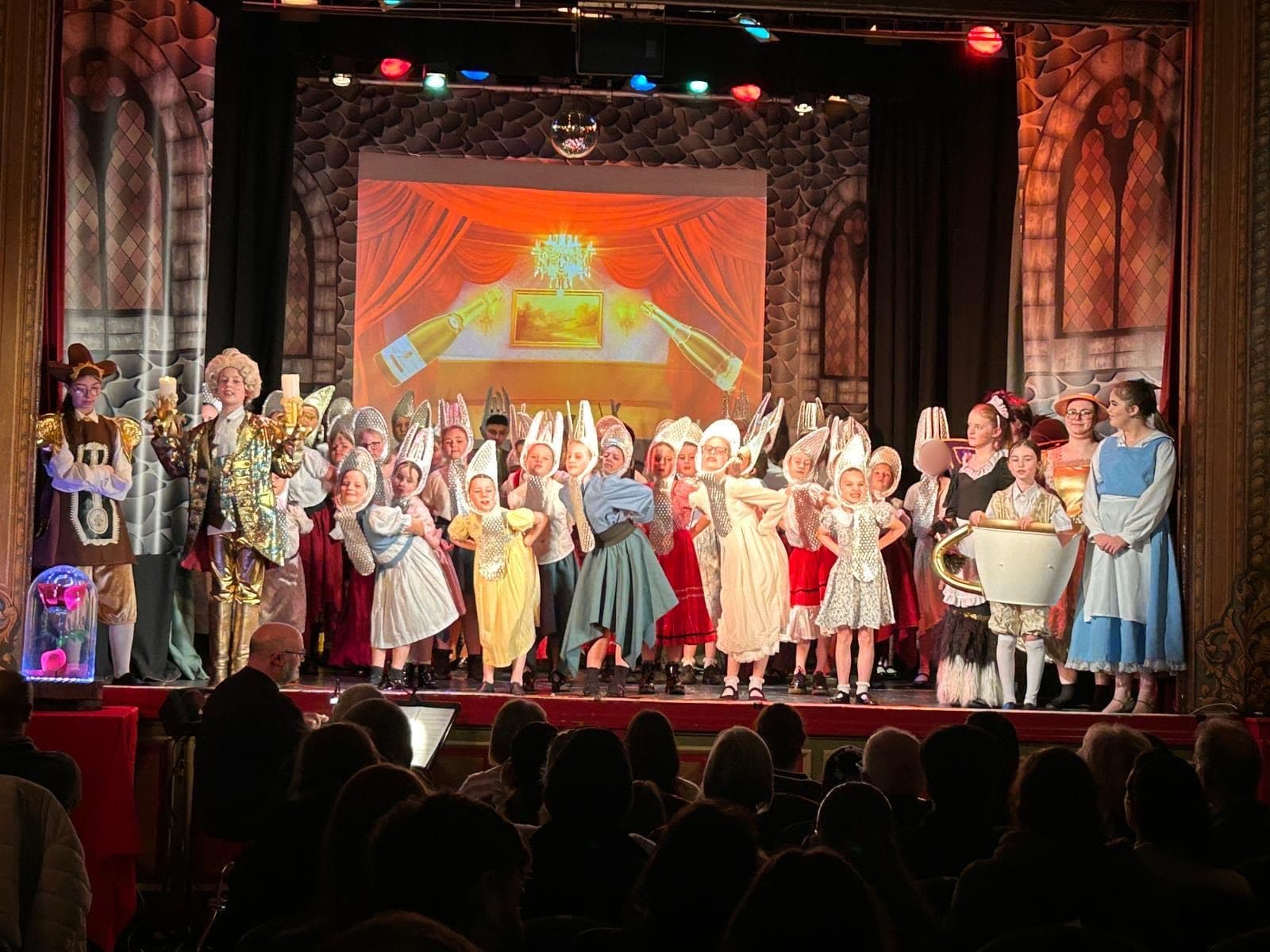 The full Courthouse Kids ensemble in costume for the ‘Be Our Guest’ number
